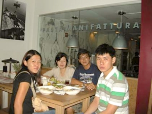 Allan and his family (wife-Linda, daughter-Candida and son-Russell) enjoying a meal together in a restaurant in Washington DC during their family holiday to the States in 2011.